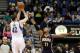 Feb 19, 2014; Minneapolis, MN, USA; Minnesota Timberwolves forward Kevin Love (42) shoots over Indiana Pacers forward David West (21) during the second quarter at Target Center. Mandatory Credit: Brace Hemmelgarn-USA TODAY Sports