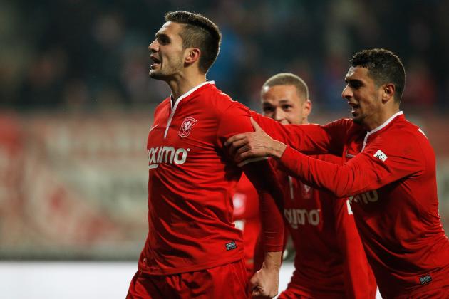 ENSCHEDE, NETHERLANDS - DECEMBER 14:  Dusan Tadic of Twente celebrates scoring the third goal of the game for his team direct from a free kick during the Eredivisie match between FC Twente and Go Ahead Eagles at De Grolsch Veste Stadium on December 14, 2013 in Enschede, Netherlands.  (Photo by Dean Mouhtaropoulos/Getty Images)