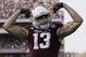 Texas A&M wide receiver Mike Evans (13) celebrates his 95-yard touchdown against Alabama during the fourth quarter of an NCAA college football game Saturday, Sept. 14, 2013, in College Station, Texas. (AP Photo/David J. Phillip)