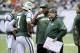 Jets QB Geno Smith (No. 7, left) and OC Marty Mornhinweg (right) could both use the help of some added talent at receiver.