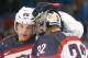 USA defenseman Ryan Suter celebrates Team USA's 5-2 win over the Czech Republic with goaltender Jonathan Quick after the men's quarterfinal hockey game in Shayba Arena at the 2014 Winter Olympics, Wednesday, Feb. 19, 2014, in Sochi, Russia. (AP Photo/Petr David Josek)