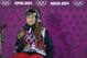 Maddie Bowman of the United States waits for her score after her first run in the women's ski halfpipe final at the Rosa Khutor Extreme Park, at the 2014 Winter Olympics, Thursday, Feb. 20, 2014, in Krasnaya Polyana, Russia. (AP Photo/Sergei Grits)