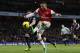 Arsenal's Alex Oxlade-Chamberlain, right, scores against Crystal Palace during their English Premier League soccer match at Emirates Stadium in London, Sunday, Feb. 2, 2014. (AP Photo/Sang Tan)