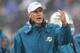 ORCHARD PARK, NY - DECEMBER 22: Head coach Joe Philbin of the Miami Dolphins motions from the sideline during NFL game action against the Buffalo Bills at Ralph Wilson Stadium on December 22, 2013 in Orchard Park, New York. (Photo by Tom Szczerbowski/Getty Images)