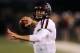 Texas A&M quarterback Johnny Manziel warms up before the start of an NCAA college football game against Missouri Saturday, Nov. 30, 2013, in Columbia, Mo. (AP Photo/L.G. Patterson)