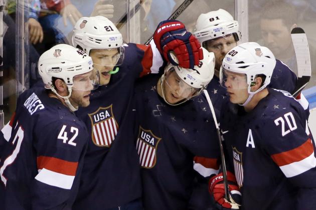 Team USA celebrates a second period goal against Russia during a men's ice hockey game at the 2014 Winter Olympics, Saturday, Feb. 15, 2014, in Sochi, Russia. (AP Photo/David J. Phillip )