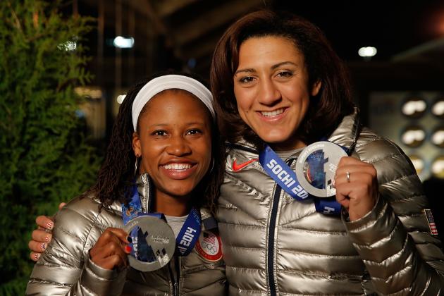 SOCHI, RUSSIA - FEBRUARY 20:  U.S. Olympians Lauryn Williams and Elana Meyers visit the USA House in the Olympic Village on February 20, 2014 in Sochi, Russia.  (Photo by Joe Scarnici/Getty Images for USOC)