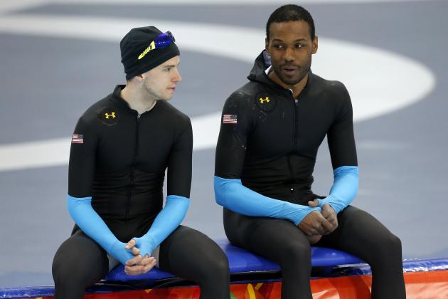 United States' Patrick Meek, left, and Shani Davis chat during a speedskating training session at the 2014 Winter Olympics in Sochi, Russia, Thursday, Feb. 20, 2014. (AP Photo/Patrick Semansky)