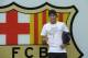 FILE - In this June 3, 2013 file photo, FC Barcelona's then new signing Neymar gestures upon his arrival at the club's office at the Camp Nou stadium in Barcelona, Spain. A Spanish court has charged Spanish league champion Barcelona with tax fraud of euro 9.1 million ($12.5 million) over the transfer of Brazil forward Neymar. Judge Pablo Ruz said in his decision, released on Thursday, Feb. 20, 2014 there was enough evidence to merit charges over Neymar's 57 million-euro (then $77 million) move from Santos last summer. Thursday's decision comes a day after public prosecutor Jose Perals charged Barcelona with fabricating simulated contracts and using