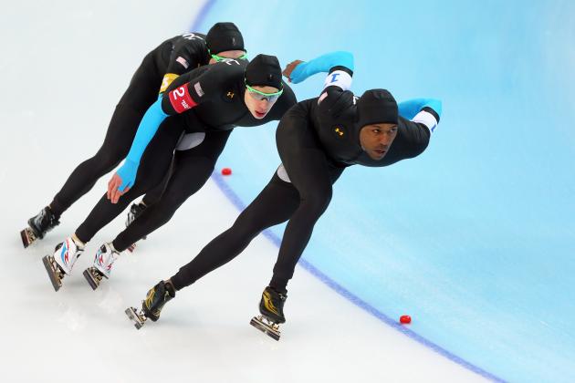 SOCHI, RUSSIA - FEBRUARY 21:  (L to R) Jonathan Kuck, Brian Hansen and Shani Davis of the United States compete during the Men's Team Pursuit Quarterfinals Speed Skating event on day fourteen of the Sochi 2014 Winter Olympics at Adler Arena Skating Center on February 21, 2014 in Sochi, Russia.  (Photo by Quinn Rooney/Getty Images)