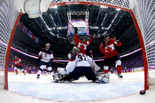 SOCHI, RUSSIA - FEBRUARY 21: Jamie Benn #22 of Canada scores a second-period goal against Jonathan Quick #32 of the United States during the Men's Ice Hockey Semifinal Playoff on Day 14 of the 2014 Sochi Winter Olympics at Bolshoy Ice Dome on February 21, 2014 in Sochi, Russia. (Photo by Julio Cortez-Pool/Getty Images)