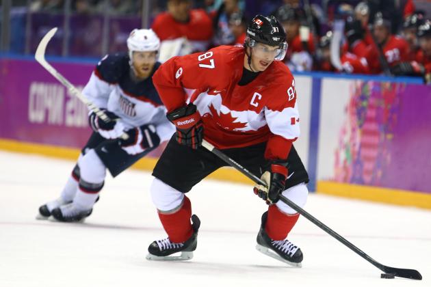 SOCHI, RUSSIA - FEBRUARY 21:  Sidney Crosby #87 of Canada controls the puck during the Men's Ice Hockey Semifinal Playoff against the United States on Day 14 of the 2014 Sochi Winter Olympics at Bolshoy Ice Dome on February 21, 2014 in Sochi, Russia.  (Photo by Al Bello/Getty Images)