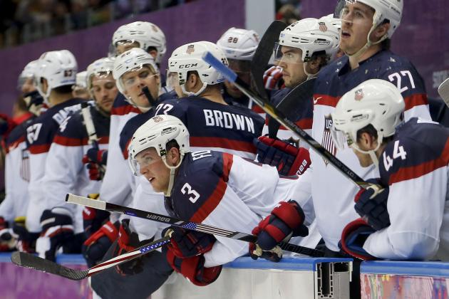 Team USA watches late in the third period against Canada during a men's semifinal ice hockey game at the 2014 Winter Olympics, Friday, Feb. 21, 2014, in Sochi, Russia. Canada won 1-0. (AP Photo/Petr David Josek)
