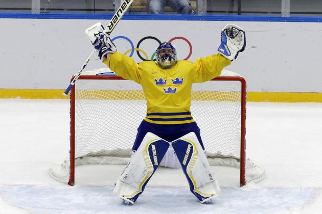 Sweden goaltender Henrik Lundqvist reacts after a men's semifinal ice hockey game against Finland at the 2014 Winter Olympics, Friday, Feb. 21, 2014, in Sochi, Russia. Sweden won 2-1 to advance to the gold medal game. (AP Photo/David J. Phillip_ )