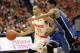 Syracuse’s Tyler Ennis, left, drives to the basket against Duke’s Quinn Cook, right, in the second half of an NCAA college basketball game in Syracuse, N.Y., Saturday, Feb. 1, 2014. Syracuse won 91-89. (AP Photo/Nick Lisi)