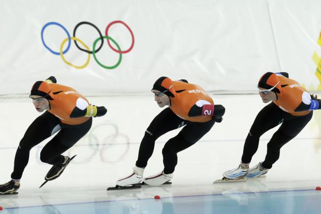 Speedskaters from the Netherlands, left to right, Sven Kramer, Jan Blokhuijsen and Koen Verweij skate on their way to win the gold medal in the mens team pursuit at the Adler Arena Skating Center at the 2014 Winter Olympics, Saturday, Feb. 22, 2014, in Sochi, Russia. (AP Photo/Matt Dunham)