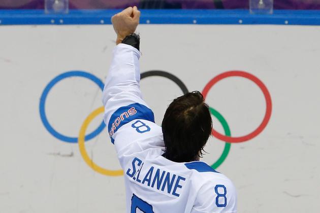 Teemu Selanne of Finland (8) gestures to the crowd after Finland defeated Team USA 5-0 in the men's bronze medal ice hockey game at the 2014 Winter Olympics, Saturday, Feb. 22, 2014, in Sochi, Russia. (AP Photo/Matt Slocum)