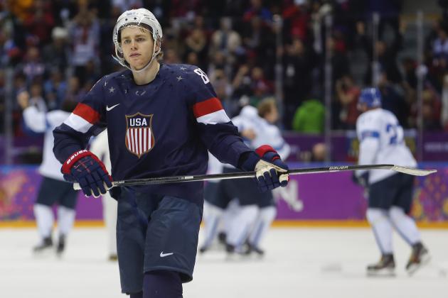USA forward Patrick Kane skates off the ice after the USA lost 5-0 to Finland in the men's bronze medal ice hockey game at the 2014 Winter Olympics, Saturday, Feb. 22, 2014, in Sochi, Russia. (AP Photo/Petr David Josek)