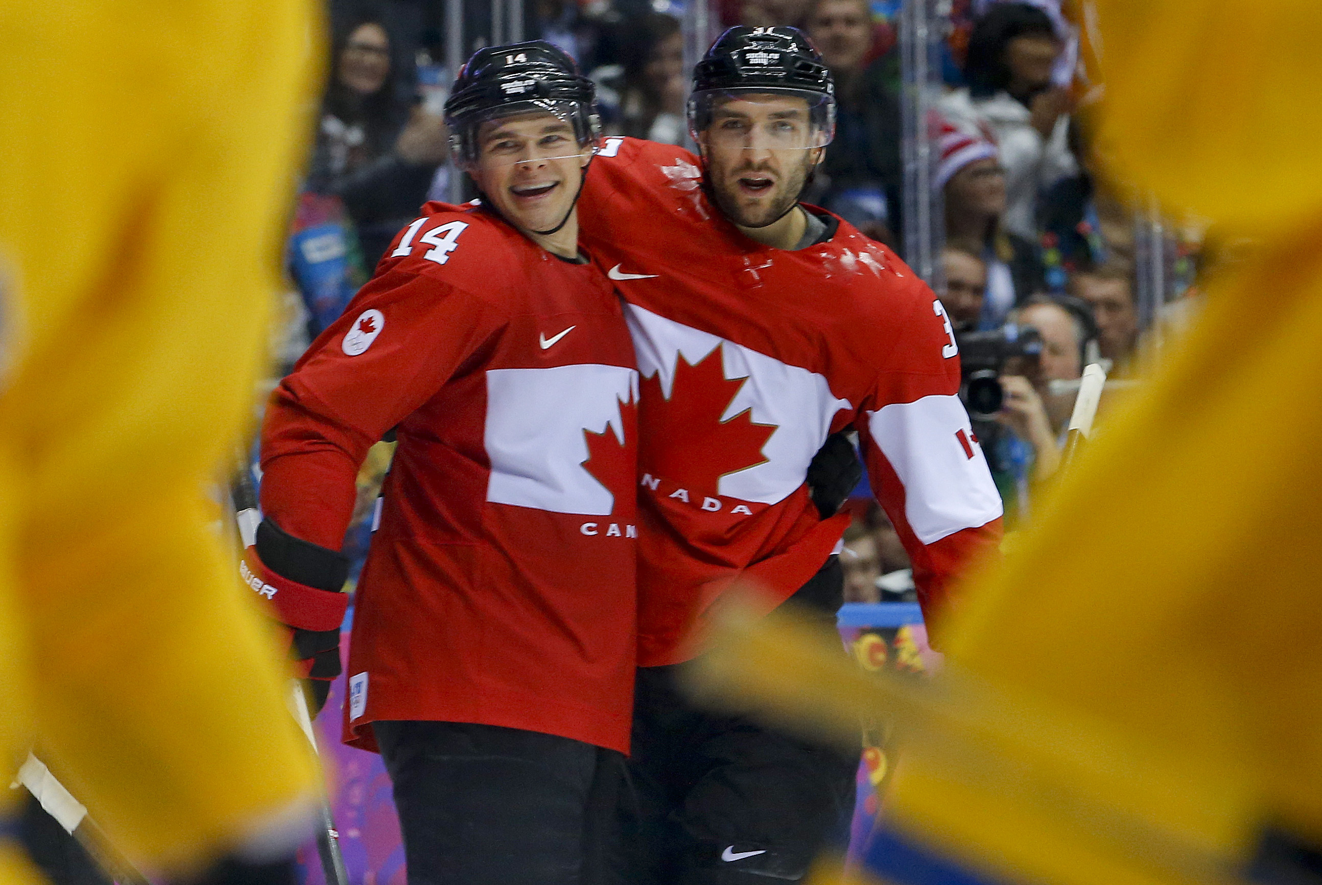 Toews wins Olympic gold; Parise claims silver for Team USA