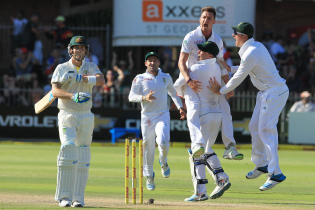 South Africa's bowler Dale Steyn, top right, celebrates with teammates after dismissing Australia's captain Michael Clarke, left, for 1 run on the fourth day of their second cricket test match at St George's Park in Port Elizabeth, South Africa, Sunday, Feb. 23, 2014. (AP Photo/ Themba Hadebe)