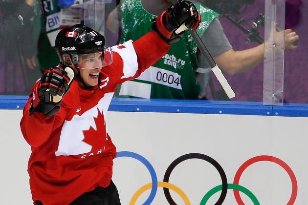 Sidney Crosby of Canada (87) celebrates his goal against Sweden during the second period of the men's gold medal ice hockey game at the 2014 Winter Olympics, Sunday, Feb. 23, 2014, in Sochi, Russia. (AP Photo/Petr David Josek)