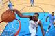 OKLAHOMA CITY, OK - FEBRUARY 23: Kevin Durant #35 of the Oklahoma City Thunder goes up for the dunk against the Los Angeles Clippers during an NBA game on February 23, 2014 at the Chesapeake Energy Arena in Oklahoma City, Oklahoma. NOTE TO USER: User expressly acknowledges and agrees that, by downloading and or using this Photograph, user is consenting to the terms and conditions of the Getty Images License Agreement. Mandatory Copyright Notice: Copyright 2014 NBAE (Photo by Layne Murdoch/NBAE via Getty Images)