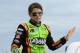 Feb 23, 2014; Daytona Beach, FL, USA; NASCAR Sprint Cup Series driver Danica Patrick (10) waves to the fans during the Daytona 500 at Daytona International Speedway. Mandatory Credit: Mike DiNovo-USA TODAY Sports