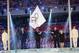 Mayor of Sochi Anatoly Pakhomov, second from left, and International Olympic Committee President Thomas Bach, third from left, applaud as Lee Seok-rai, mayor of Pyeongchang, waves the Olympic flag during the closing ceremony of the 2014 Winter Olympics, Sunday, Feb. 23, 2014, in Sochi, Russia. (AP Photo/Jung Yeon-je, Pool)