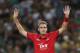 England's Stuart Broad holds up his arms during their T20 International cricket match against Australia in Sydney Sunday, Feb. 2, 2014.(AP Photo/Rob Griffith)