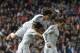 Real's Gareth Bale, right, celebrates his goal with teammates during a Spanish La Liga soccer match between Real Madrid and Elche at the Santiago Bernabeu stadium in Madrid, Spain, Saturday, Feb. 22, 2014. (AP Photo/Andres Kudacki)