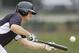 New York Yankees center fielder Brett Gardner bunts during spring training baseball practice Friday, Feb. 21, 2014, in Tampa, Fla. (AP Photo/Charlie Neibergall)