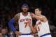 New York Knicks' Carmelo Anthony (7) talks to teammate Pablo Prigioni (9), of Argentina, during the second half of an NBA basketball game against the Miami Heat Saturday, Feb. 1, 2014, in New York. Miami won 106-91. (AP Photo/Jason DeCrow)