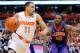 Feb 9, 2014; Syracuse, NY, USA; Syracuse Orange guard Tyler Ennis (11) dribbles the ball in front of Clemson Tigers guard Rod Hall (12) during the first half at the Carrier Dome. Mandatory Credit: Rich Barnes-USA TODAY Sports