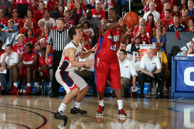 Nov 25, 2013; Maui, HI, USA; Gonzaga Bulldogs guard Kevin Pangos (4) defends Dayton Flyers guard Jordan Sibert (24) during the first round of the Maui Invitational at the Lahaina Civic Center. Dayton defeats Gonzaga 84-79. Mandatory Credit: Brian Spurlock-USA TODAY Sports