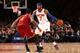 NEW YORK, NY - JANUARY 30: Carmelo Anthony #7 of the New York Knicks dribbles against Earl Clark #6 of the Cleveland Cavaliers during a game at Madison Square Garden in New York City on January 30, 2014. NOTE TO USER: User expressly acknowledges and agrees that, by downloading and or using this photograph, User is consenting to the terms and conditions of the Getty Images License Agreement. Mandatory Copyright Notice: Copyright 2014 NBAE (Photo by Nathaniel S. Butler/NBAE via Getty Images)