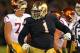 SOUTH BEND, IN - OCTOBER 19: Louis Nix III #1 of the Notre Dame Fighting Irish celebrates near the end of the game against the University of Southern California Trojans at Notre Dame Stadium on October 19, 2013 in South Bend, Indiana. Notre Dame defeated USC 14-10. (Photo by Jonathan Daniel/Getty Images)