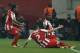 Olympiakos' Joel Campbell, right, celebrates his goal with teammates against Manchester United' during a Champions League, round of 16, first leg soccer match at Georgios Karaiskakis stadium, in Piraeus port, near Athens, on Tuesday, Feb. 25, 2014. (AP Photo/Petros Giannakouris)