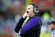 Northwestern head coach Pat Fitzgerald looks at the scoreboard during an NCAA college football game on Saturday, Nov. 30, 2013, against Illinois in Champaign, Ill. (AP Photo/Jeff Haynes)