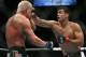 Lyoto Machida of Brazil, right, exchanges blows with Tito Ortiz during their UFC Light Heavyweight match at the MGM Grand Garden Arena Saturday, May 24, 2008 in Las Vegas. (AP Photo/Eric Jamison)