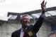 Manchester United manager Sir Alex Ferguson waves to supporters before his last game in charge of his team, their English Premier League soccer match away at West Bromwich Albion at The Hawthorns Stadium, West Bromwich, England, Sunday May. 19, 2013. (AP Photo/Jon Super)