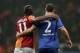 Former Chelsea star, Didier Drogba of Galatasaray, left, and Branislav Ivanovic of Chelsea during their Champions League Round of 16, First Leg match between Galatasaray and Chelsea at Turk Telekom Arena Stadium in Istanbul, Turkey, Wednesday, Feb. 26, 2014. (AP Photo/Emrah Gurel)