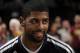 CLEVELAND, OH - FEBRUARY 19: Close up of Kyrie Irving #2 of the Cleveland Cavaliers prior to the game against the Orlando Magic at The Quicken Loans Arena on February 19, 2014 in Cleveland, Ohio. NOTE TO USER: User expressly acknowledges and agrees that, by downloading and/or using this Photograph, user is consenting to the terms and conditions of the Getty Images License Agreement. Mandatory Copyright Notice: Copyright 2014 NBAE (Photo by David Liam Kyle/NBAE via Getty Images)