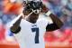 Sep 29, 2013; Denver, CO, USA; Philadelphia Eagles quarterback Michael Vick (7) before the game against the Denver Broncos at Sports Authority Field at Mile High. Mandatory Credit: Chris Humphreys-USA TODAY Sports