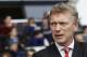 Manchester United's manager David Moyes looks on from the dugout before the start of their English Premier League soccer match against Tottenham Hotspur at White Hart Lane, London, Sunday, Dec. 1, 2013. (AP Photo/Sang Tan)