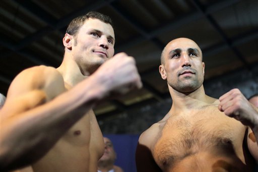 WBO Super middleweight champion, German Arthur Abraham , right, and his challenger Robert Stieglitz pose at the weighing in Magdeburg, eastern Germany, Friday March 22, 2013. The title bout is scheduled for Saturday evening. (AP Photo/dpa,Jens Wolf)