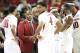Feb 15, 2014; Fayetteville, AR, USA; Arkansas Razorbacks head coach Mike Anderson talks to his players including forward Coty Clarke (4) during the game against the Louisiana State Tigers at Bud Walton Arena. Arkansas defeated LSU 81-70. Mandatory Credit: Nelson Chenault-USA TODAY Sports