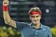 Roger Federer of Switzerland celebrates after he beat Novak Djokovic of Serbia during a semifinal match of the Dubai Tennis Championships in Dubai, United Arab Emirates, Friday, Feb. 28, 2014. (AP Photo/Kamran Jebreili)