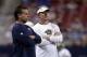 St. Louis Rams head coach Jeff Fisher, left, and general manager Les Snead watch during an NFL football training camp scrimmage inside the Edward Jones Dome, Saturday, Aug. 3, 2013, in St. Louis. (AP Photo/Jeff Roberson)