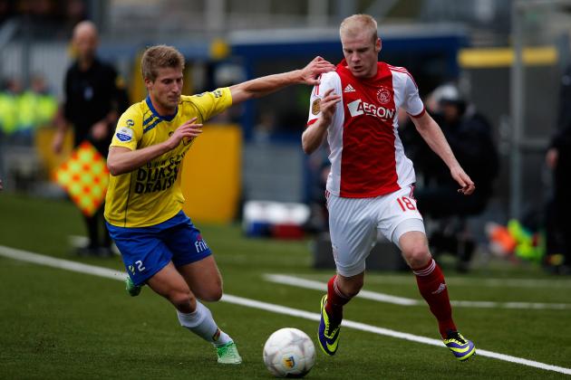 LEEUWARDEN, NETHERLANDS - DECEMBER 15:  Wout Droste of Cambuur and Davy Klaassen of Ajax battle for the ball during the Eredivisie match between SC Cambuur and Ajax Amsterdam held at Cambuur Stadion on December 15, 2013 in Leeuwarden, Netherlands.  (Photo by Dean Mouhtaropoulos/Getty Images)