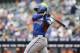 World's Miguel Sano grounds out in the second inning of the All-Star Futures baseball game against the United States on Sunday, July 14, 2013, in New York. (AP Photo/Kathy Willens)